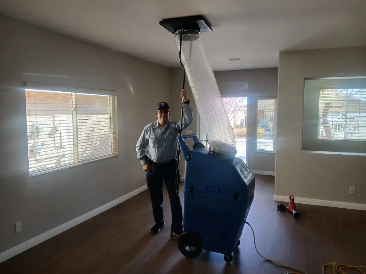 Professional Dryer Vent Cleaning work inside a Benton home